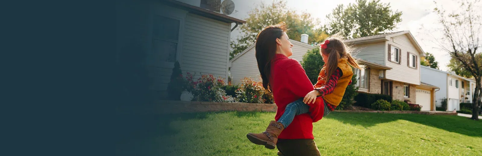 Mother and daughter playing outside